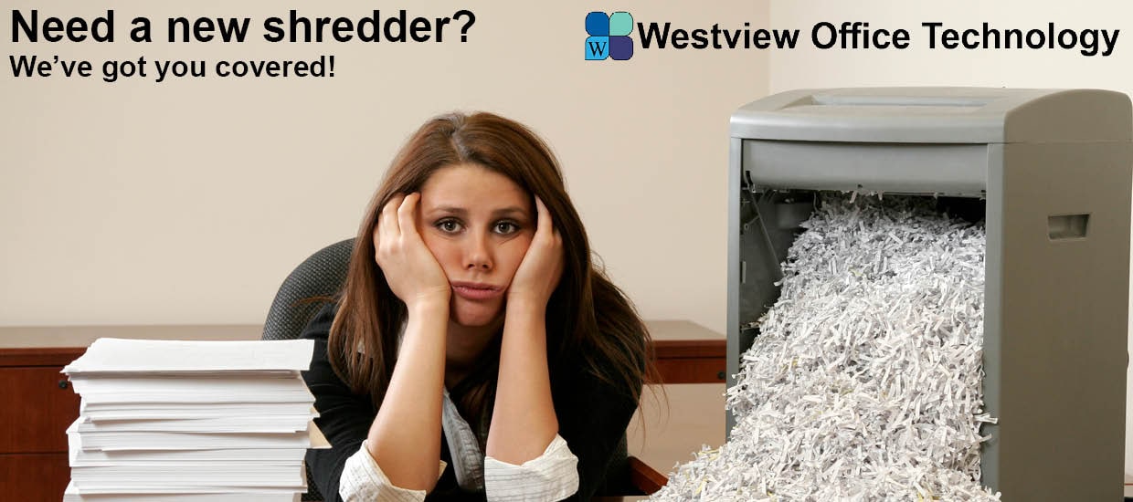 woman frustrated by amount of shredding she needs to do.